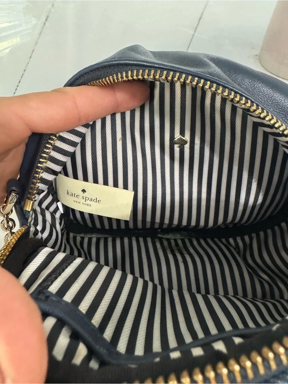 kate spade Black Denim Crossbody with Pink Floral Print and Tassel